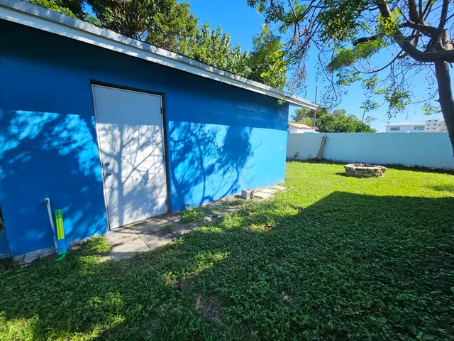 a view of a backyard with a garden