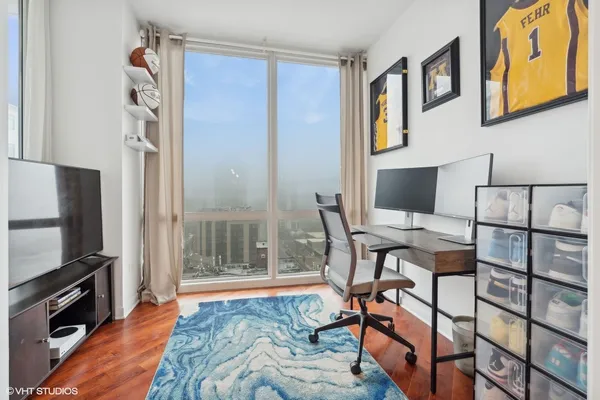 a workspace with furniture and window