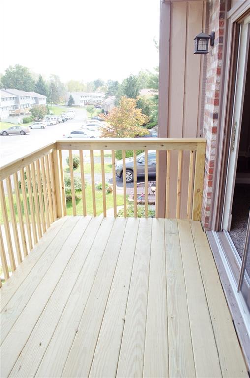 2005 Clearfork Road Bridgeville, PA 15017 - Photo 17 of 25 The brand new decking on the front of the townhome provides space to enjoy some fresh air any time of day.