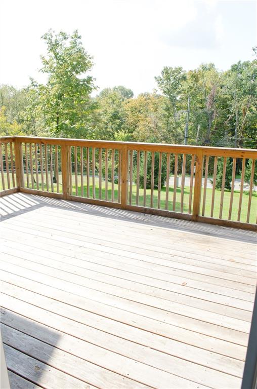 2005 Clearfork Road Bridgeville, PA 15017 - Photo 19 of 25 Brand new decking on the back deck gives you extra entertaining space for dinner under the stars.
