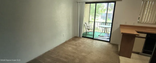 a view of livingroom with furniture
