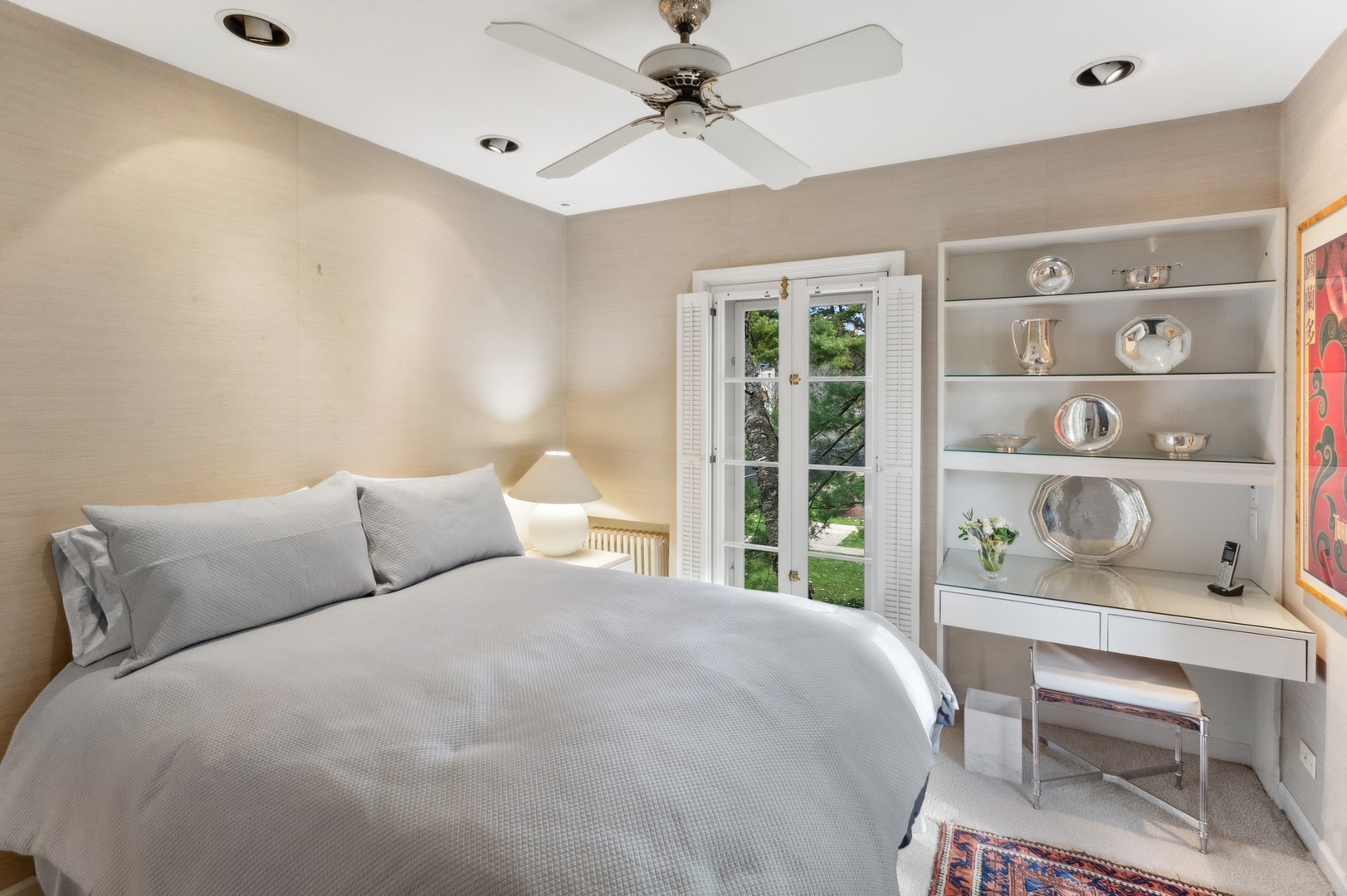 228 Sheridan Road Winnetka, IL 60093 - Photo 22 of 32 a bedroom with a bed a table and a window