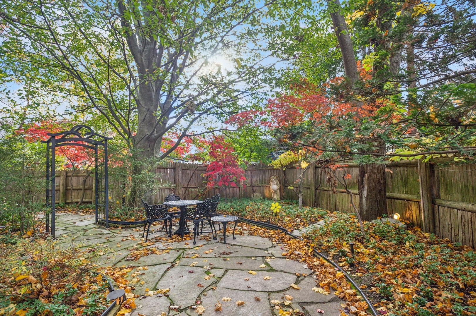228 Sheridan Road Winnetka, IL 60093 - Photo 30 of 32 a view of a chairs and tables in the patio