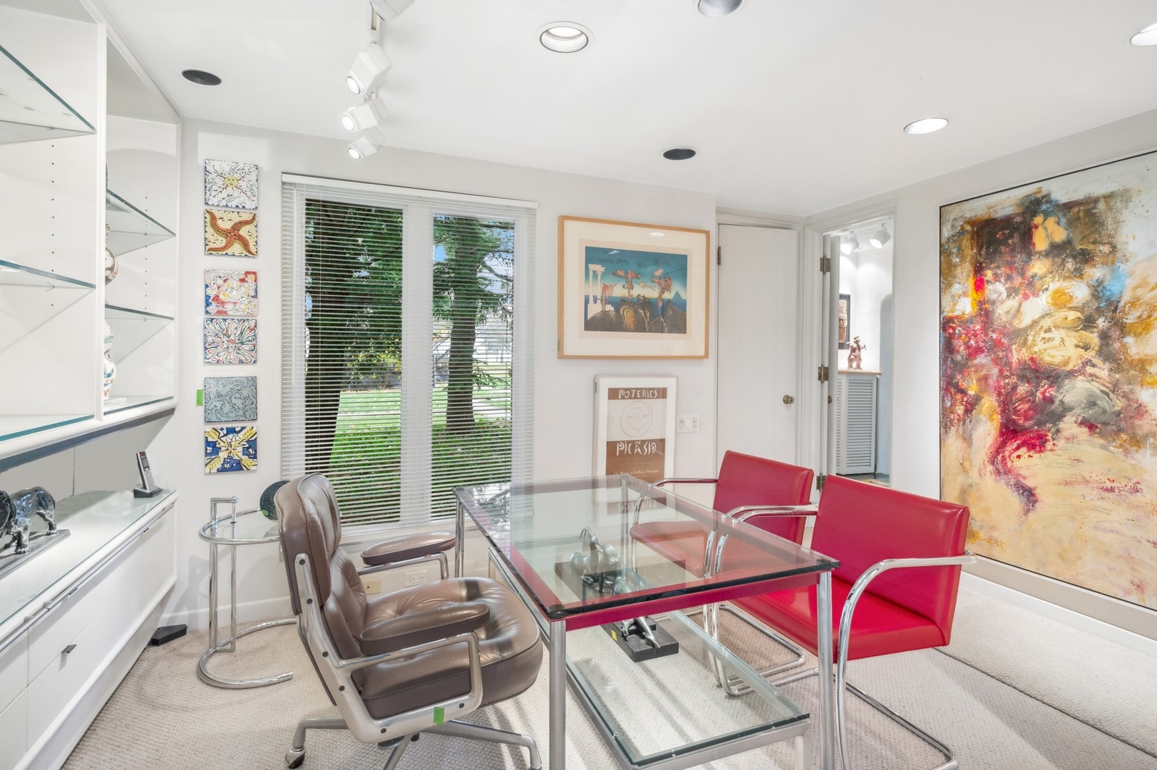 228 Sheridan Road Winnetka, IL 60093 - Photo 7 of 32 a living room with furniture and a floor to ceiling window