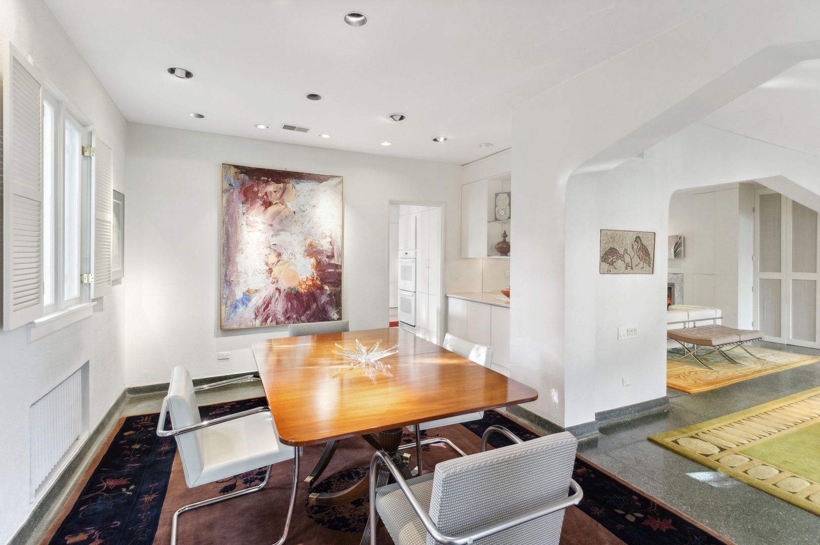 228 Sheridan Road Winnetka, IL 60093 - Photo 9 of 32 a view of a dining room with furniture and a window