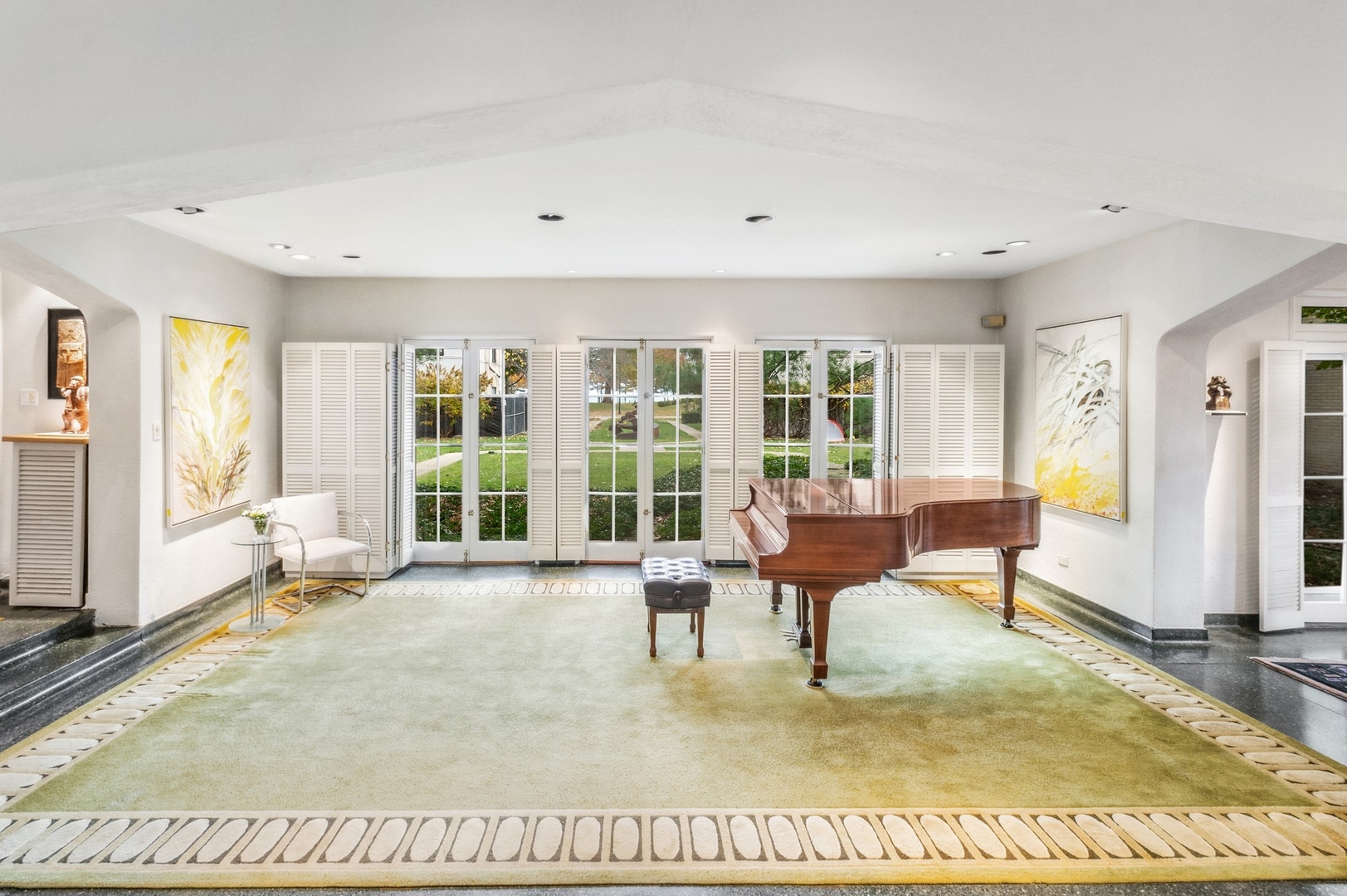 228 Sheridan Road Winnetka, IL 60093 - Photo 10 of 32 a living room with furniture and a large window