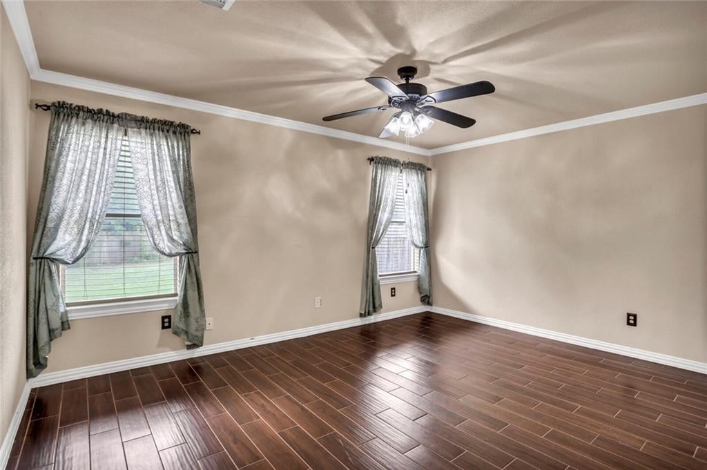 1257 Pine Portage Loop Leander, TX 78641 - Photo 12 of 32 Master bedroom with 2 standard windows for natural light