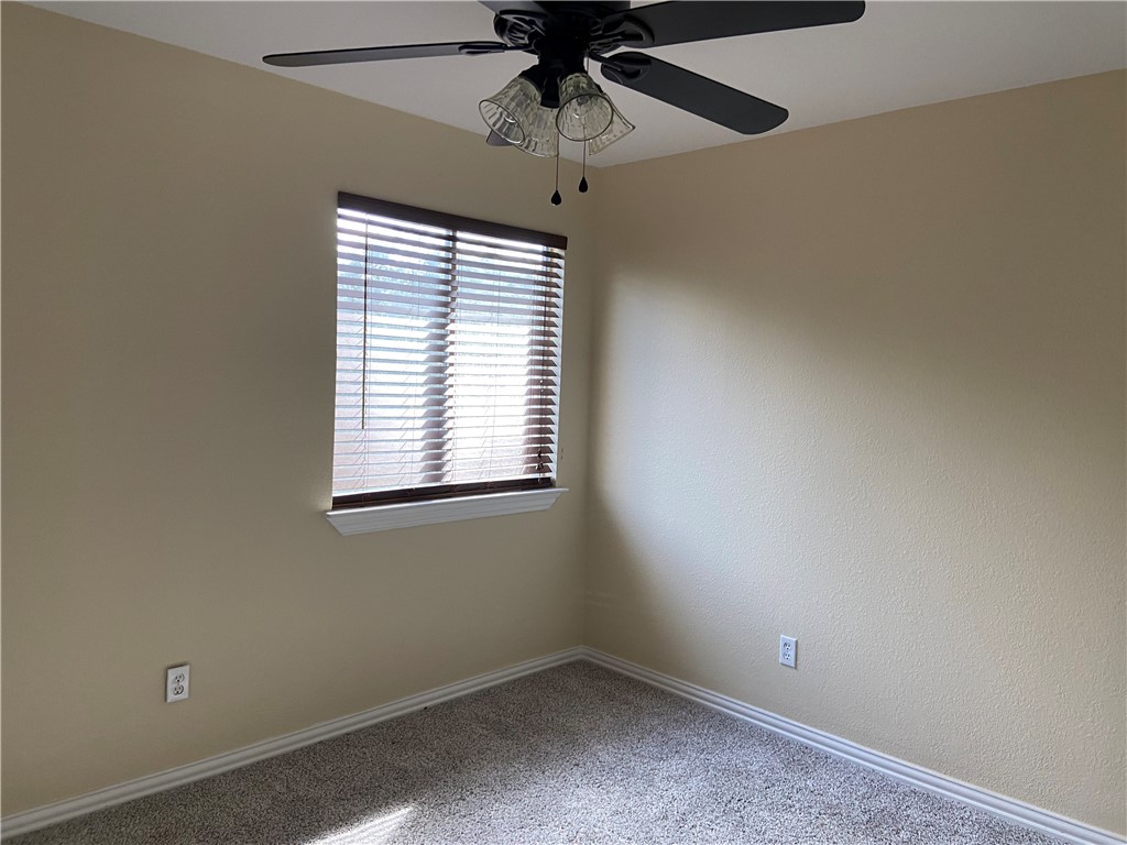 1257 Pine Portage Loop Leander, TX 78641 - Photo 18 of 32 Back right corner bedroom