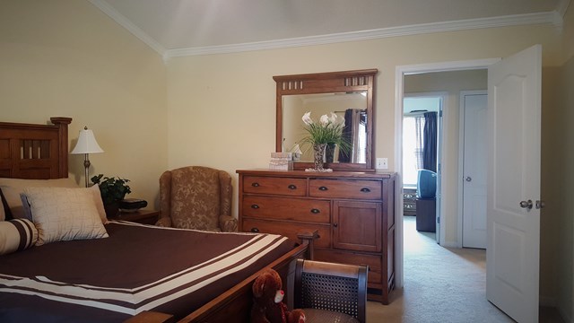 3335 Trotters Ridge Trail Gray, GA 31032 - Photo 7 of 25 a room with furniture and mirror