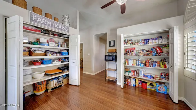 a room with furniture and a book shelf