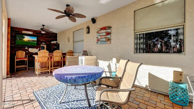 a view of a livingroom with furniture and window