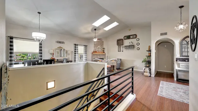 a view of kitchen and dining room with wooden floor