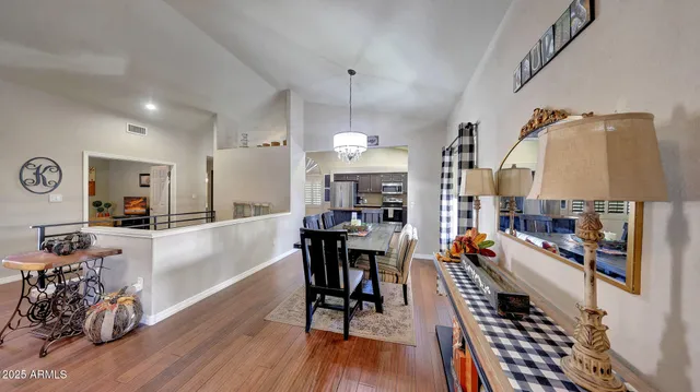 a view of a kitchen and dining room