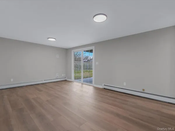 a view of a patio with couches and potted plants