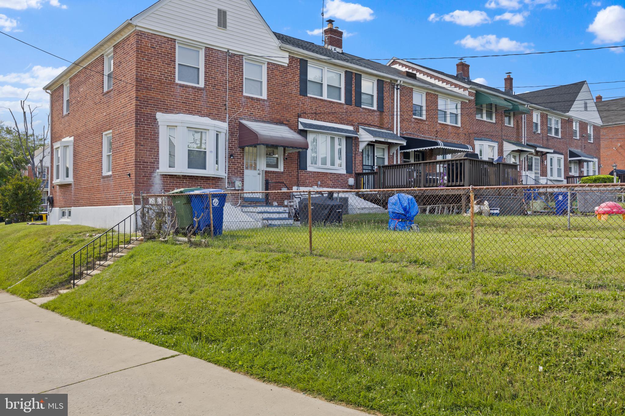 4511 Marble Hall Road Baltimore, MD 21239 - Photo 47 of 48 a view of a house with a yard