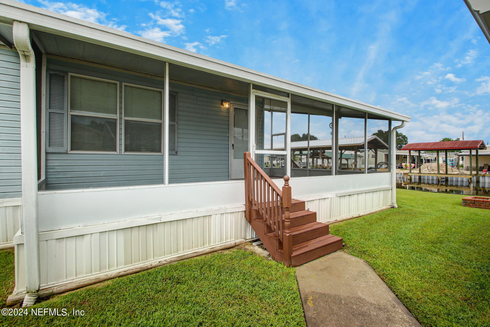 118 Paradise Drive Welaka, FL 32193 - Photo 1 of 43 4-Paradise Dr 118-Entrance