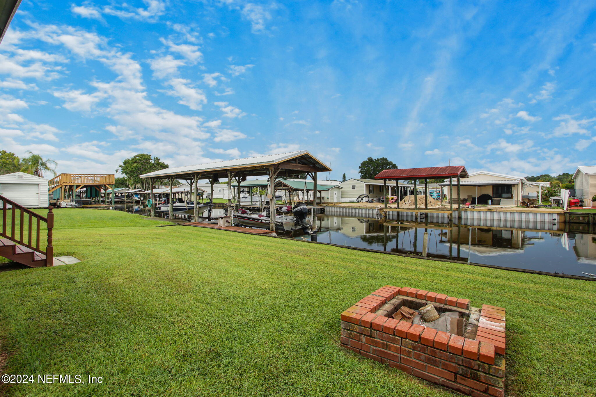 118 Paradise Drive Welaka, FL 32193 - Photo 2 of 43 26-Paradise Dr 118-Back Yard 1