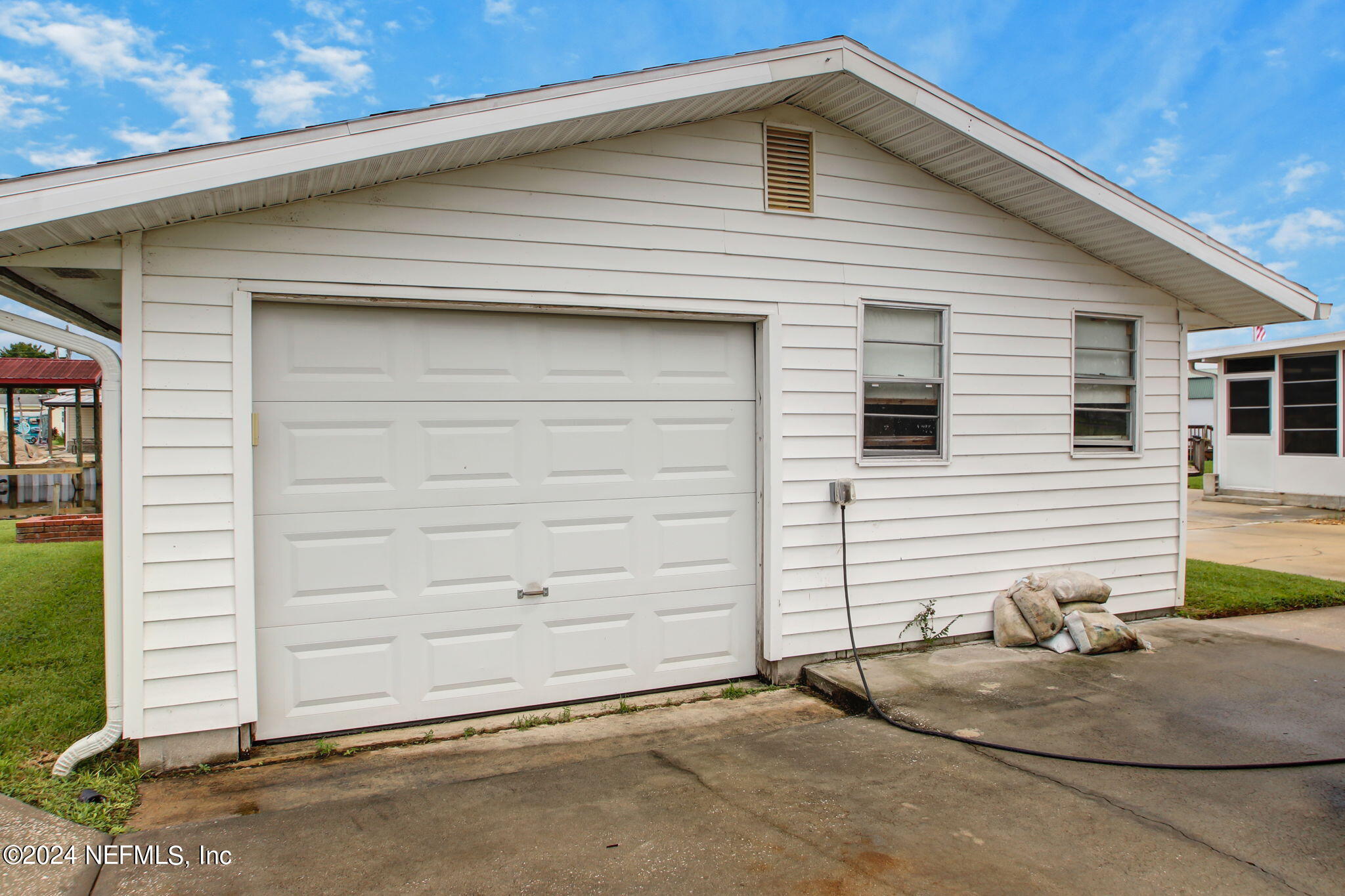 118 Paradise Drive Welaka, FL 32193 - Photo 38 of 43 32-Paradise Dr 118-Garage Exterior