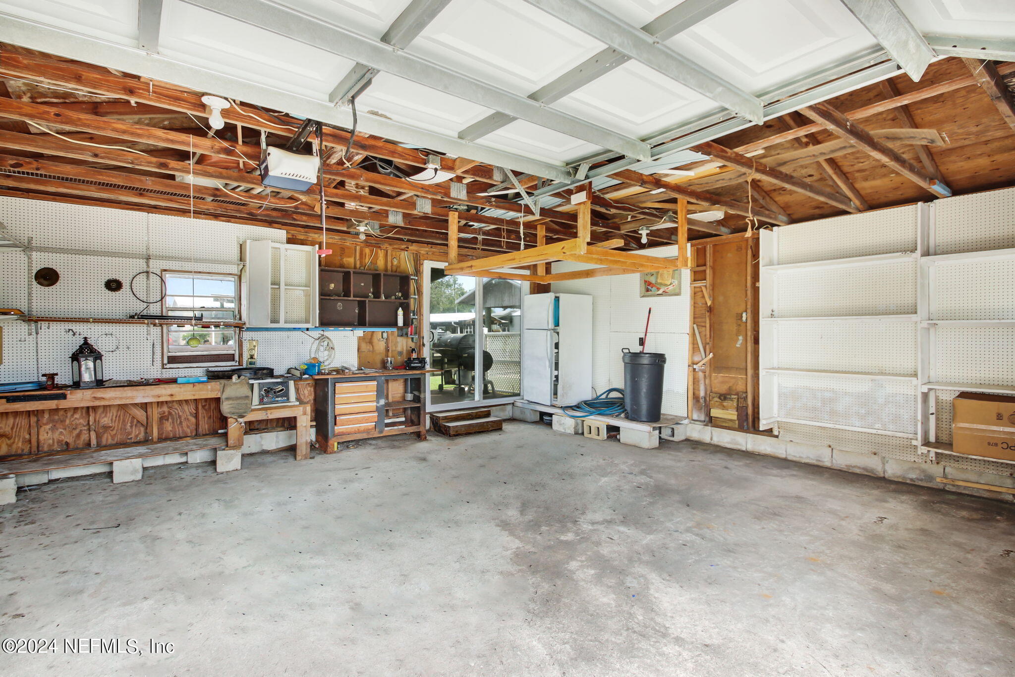 118 Paradise Drive Welaka, FL 32193 - Photo 39 of 43 33-Paradise Dr 118-Garage Interior