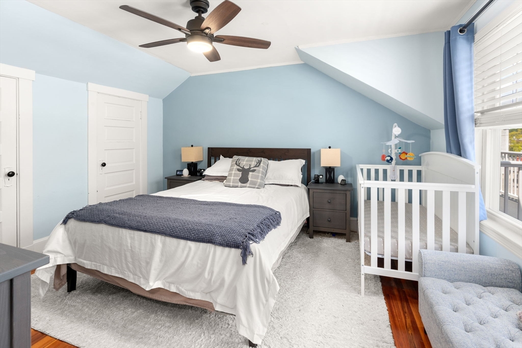 17 Maple Street, Unit 17 Needham, MA 02492 - Photo 15 of 24 a bedroom with a bed and a window