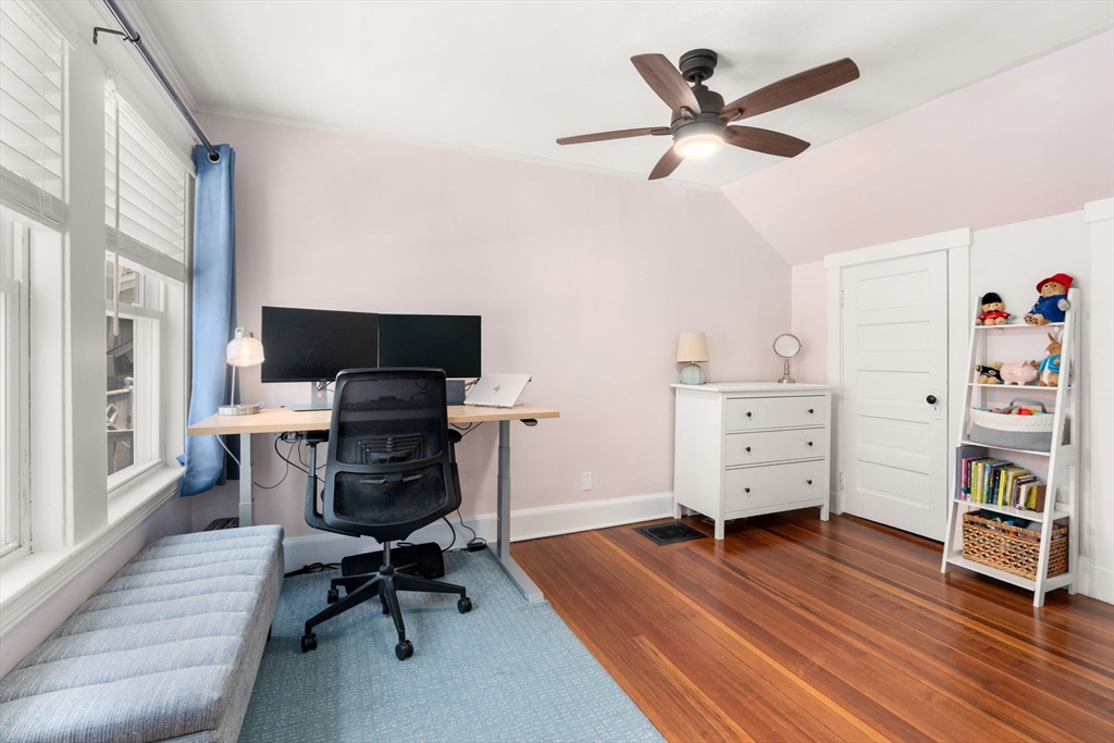 17 Maple Street, Unit 17 Needham, MA 02492 - Photo 17 of 24 a view of a workspace with furniture and a window