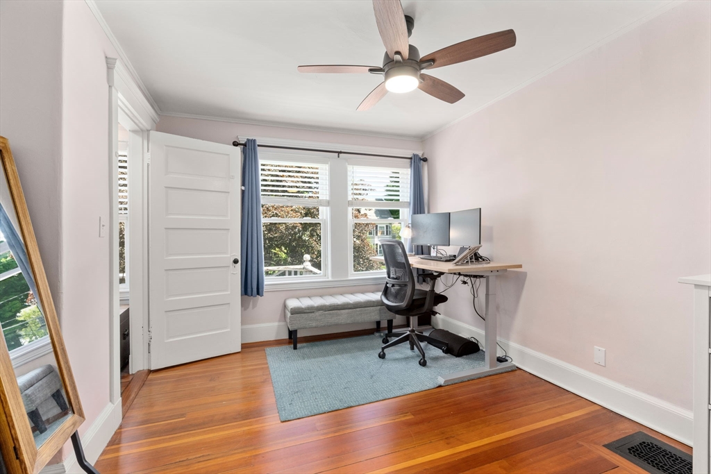 17 Maple Street, Unit 17 Needham, MA 02492 - Photo 18 of 24 a view of a workspace with furniture and a window