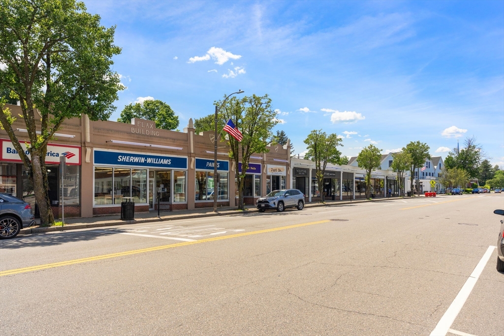 17 Maple Street, Unit 17 Needham, MA 02492 - Photo 22 of 24 a view of a street with a building and a street light