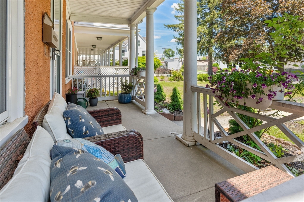 17 Maple Street, Unit 17 Needham, MA 02492 - Photo 4 of 24 a view of balcony with couch
