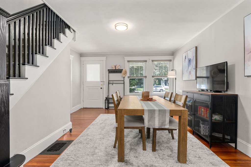 17 Maple Street, Unit 17 Needham, MA 02492 - Photo 6 of 24 a view of a dining room with furniture