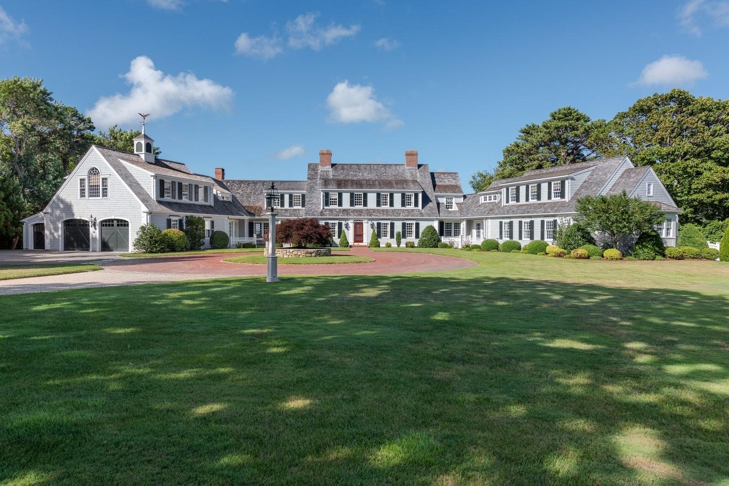 56 Rendezvous Lane Barnstable, MA 02630 - Photo 1 of 35 a front view of a house with a yard