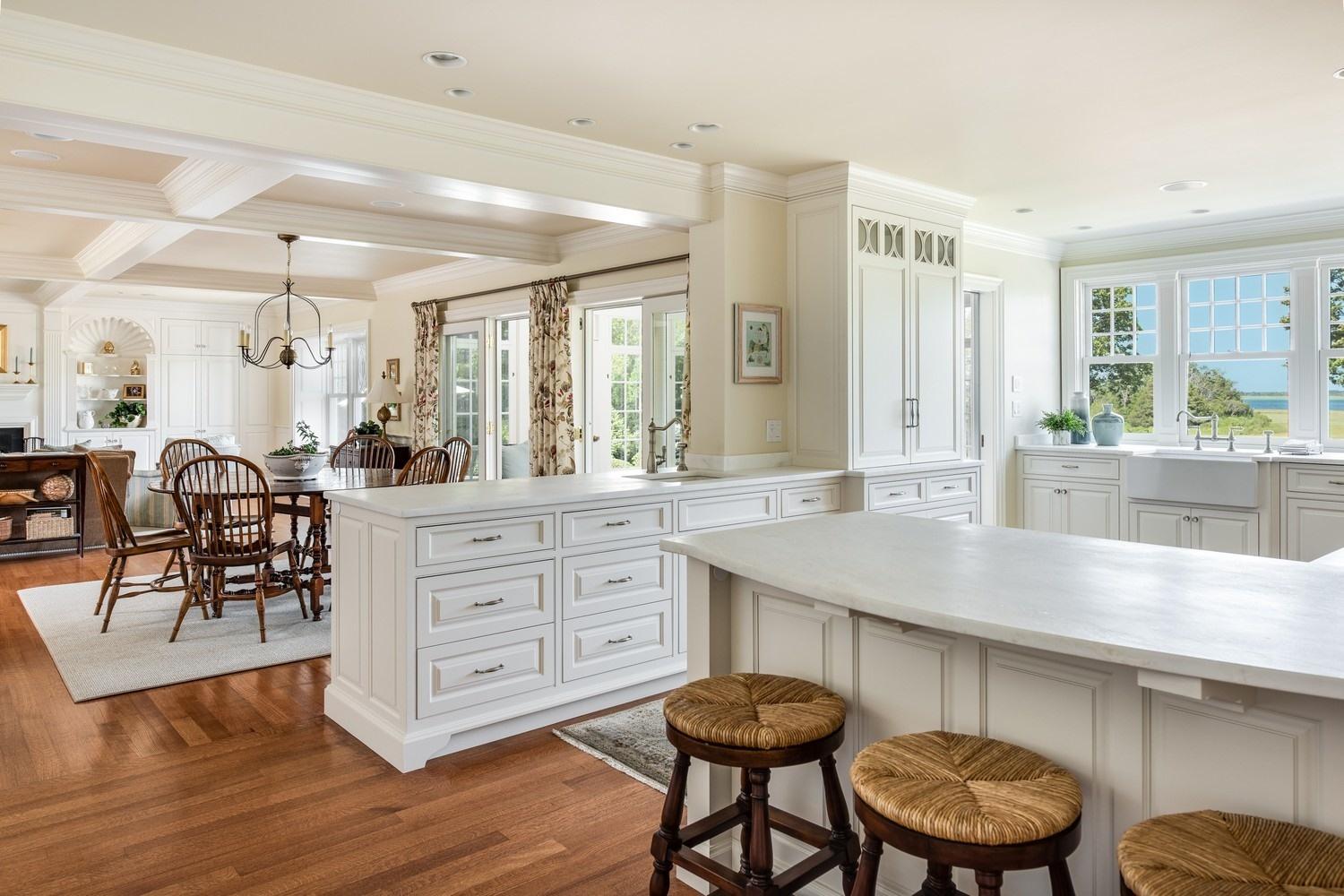 56 Rendezvous Lane Barnstable, MA 02630 - Photo 13 of 35 a kitchen with cabinets and chairs