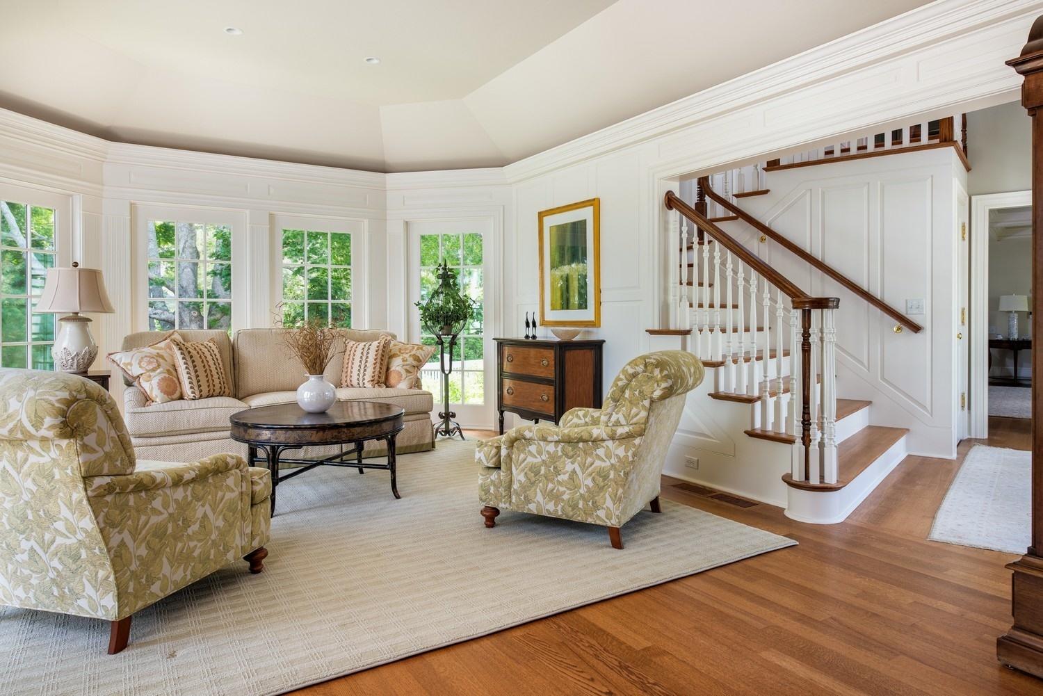 56 Rendezvous Lane Barnstable, MA 02630 - Photo 20 of 35 a living room with furniture and a wooden floor