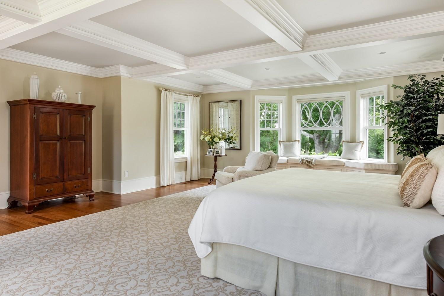 56 Rendezvous Lane Barnstable, MA 02630 - Photo 21 of 35 a spacious bedroom with a large bed and large windows