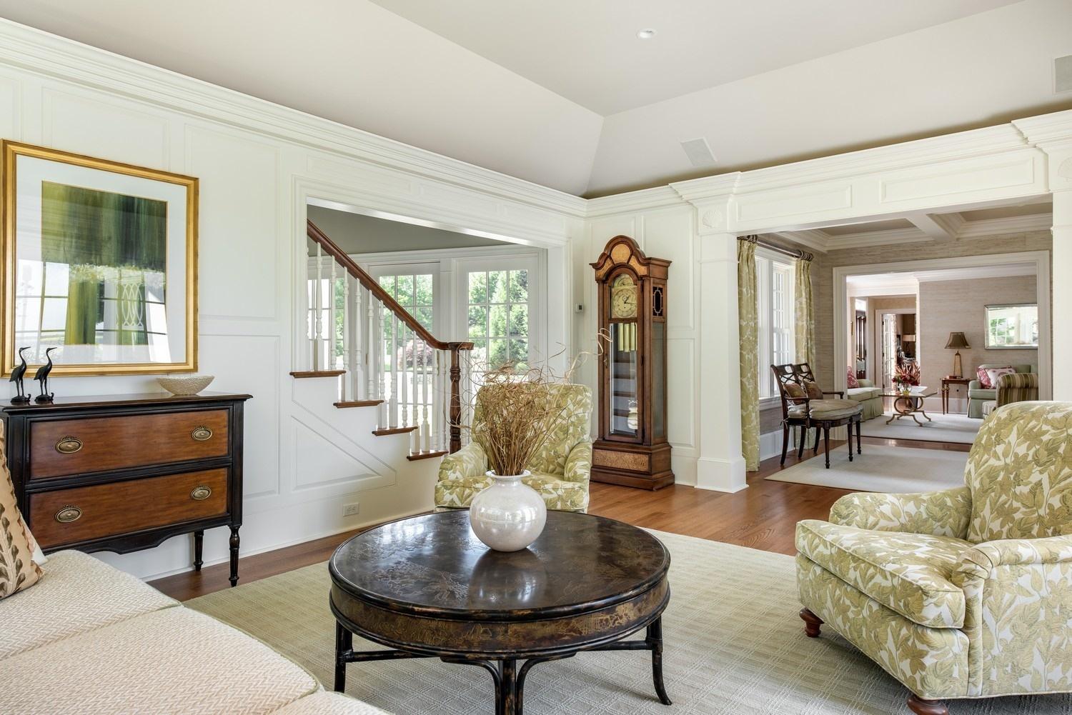 56 Rendezvous Lane Barnstable, MA 02630 - Photo 23 of 35 a living room with furniture and a potted plant