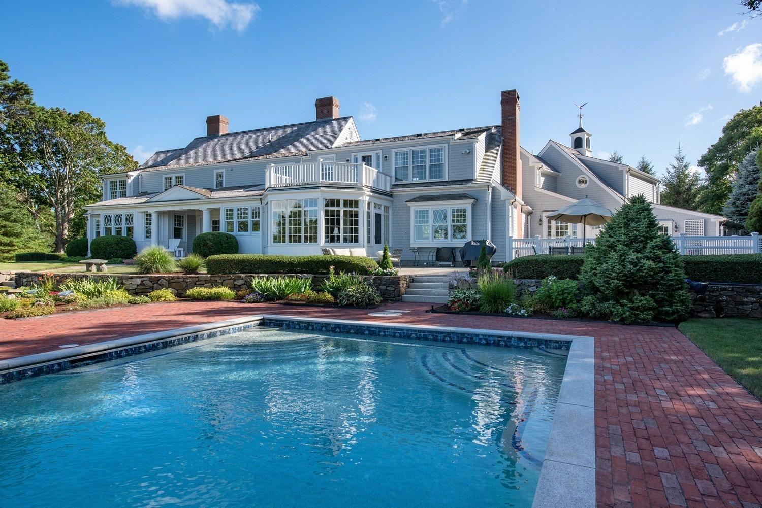 56 Rendezvous Lane Barnstable, MA 02630 - Photo 7 of 35 a front view of a house with swimming pool