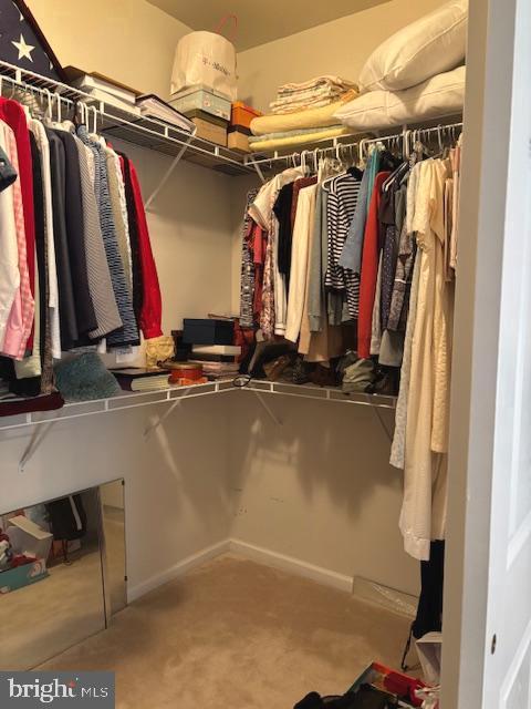 51 Country Lane Columbus, NJ 08022 - Photo 22 of 31 a view of walk in closet with clothes and shoes