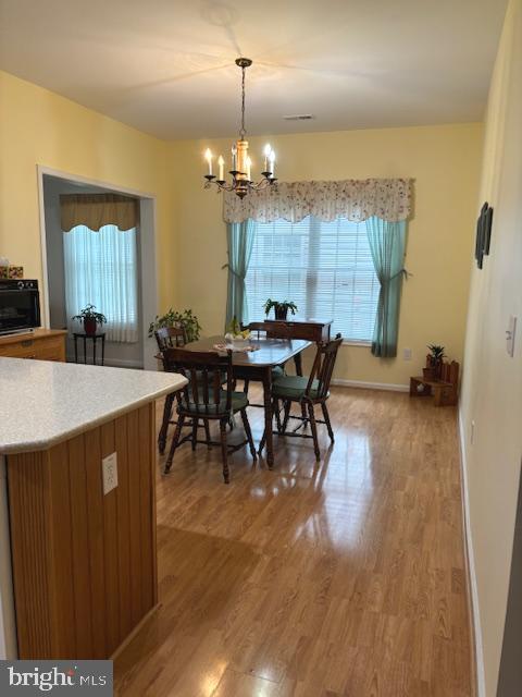 51 Country Lane Columbus, NJ 08022 - Photo 8 of 31 a view of a dining room with furniture window and wooden floor