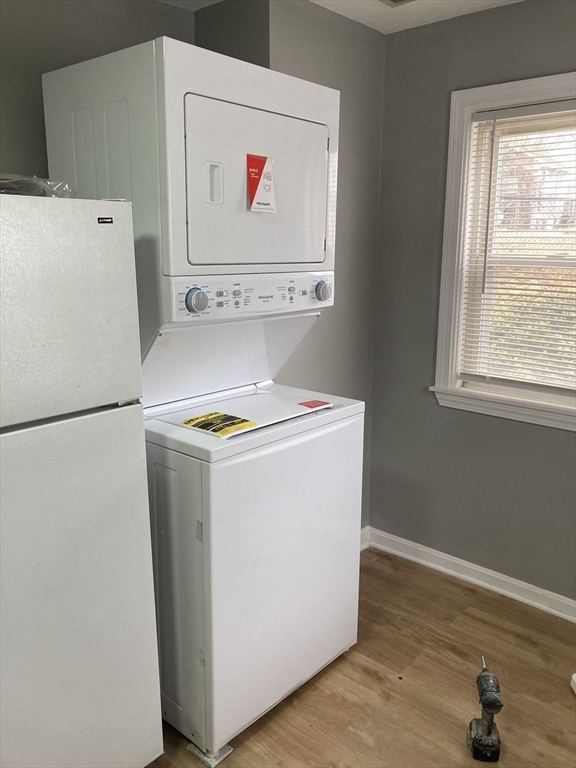 19-25 Common Street Weymouth, MA 02188 - Photo 13 of 41 a utility room with dryer and washer