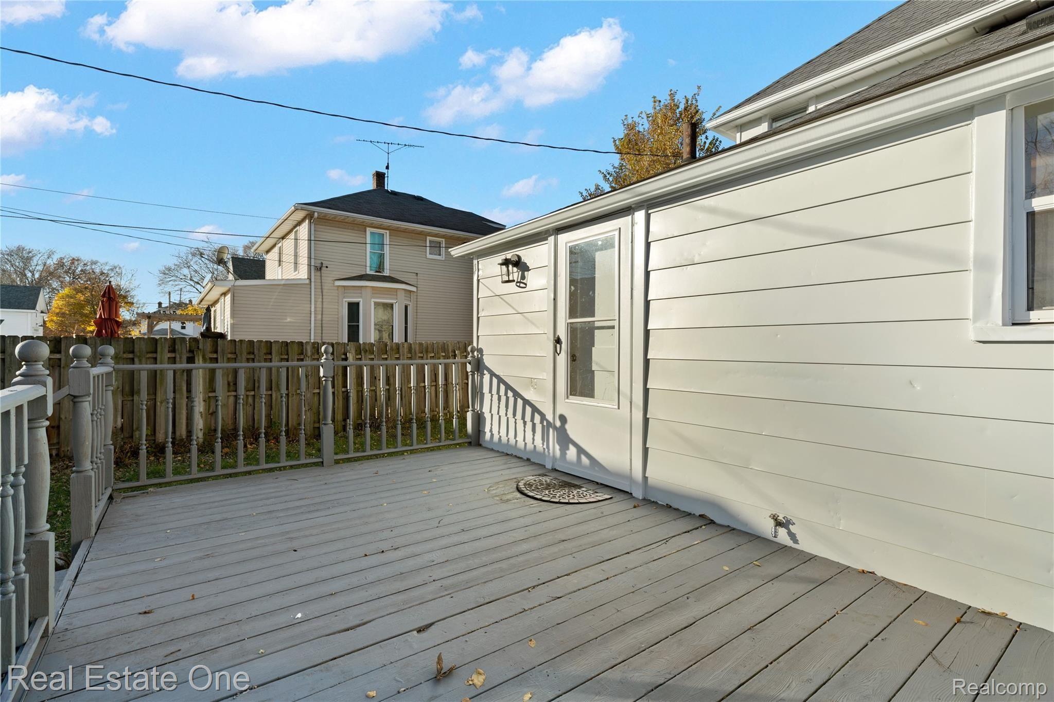 36755 Goddard Road Romulus, MI 48174 - Photo 24 of 27 REAR DOOR ENTRY OFF DECK