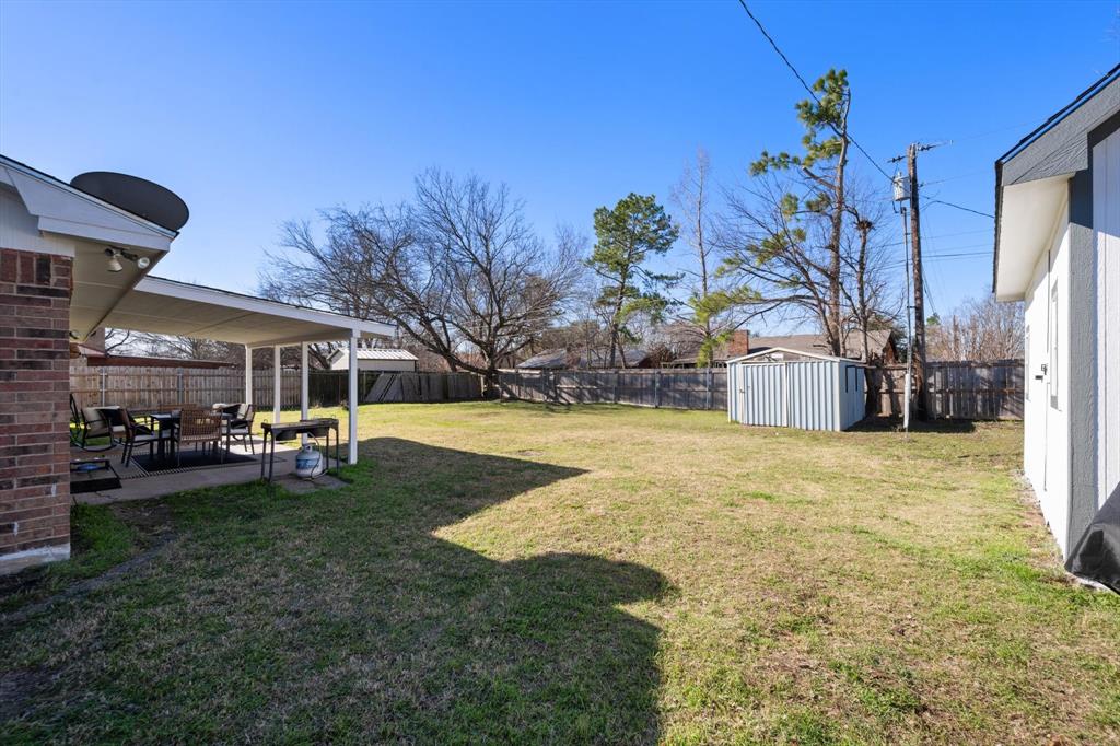 137 North Jessup Street Alvarado, TX 76009 - Photo 18 of 23 a view of a house with backyard and sitting area