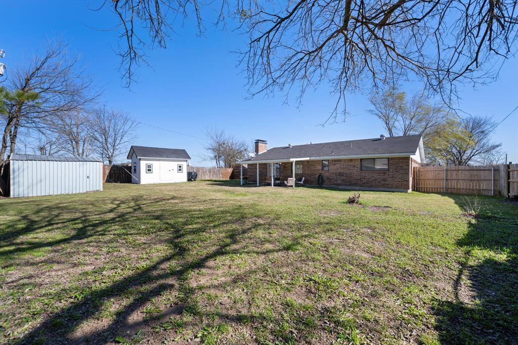 137 North Jessup Street Alvarado, TX 76009 - Photo 20 of 23 a front view of a house with a yard