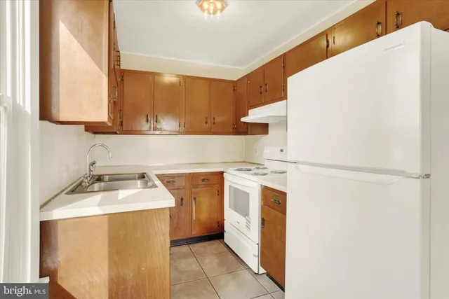 a utility room with washer and dryer
