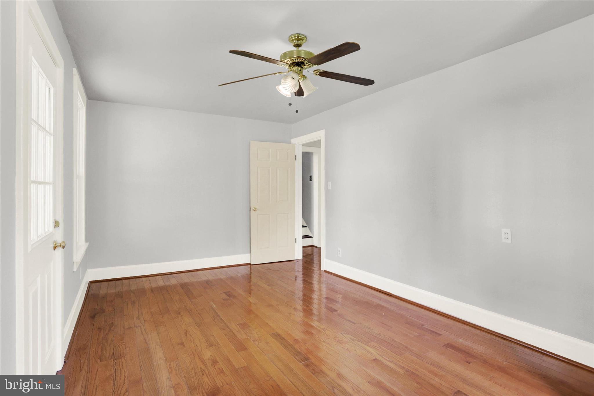 100 Roseglen Road Duncannon, PA 17020 - Photo 17 of 35 an empty room with wooden floor and ceiling fan