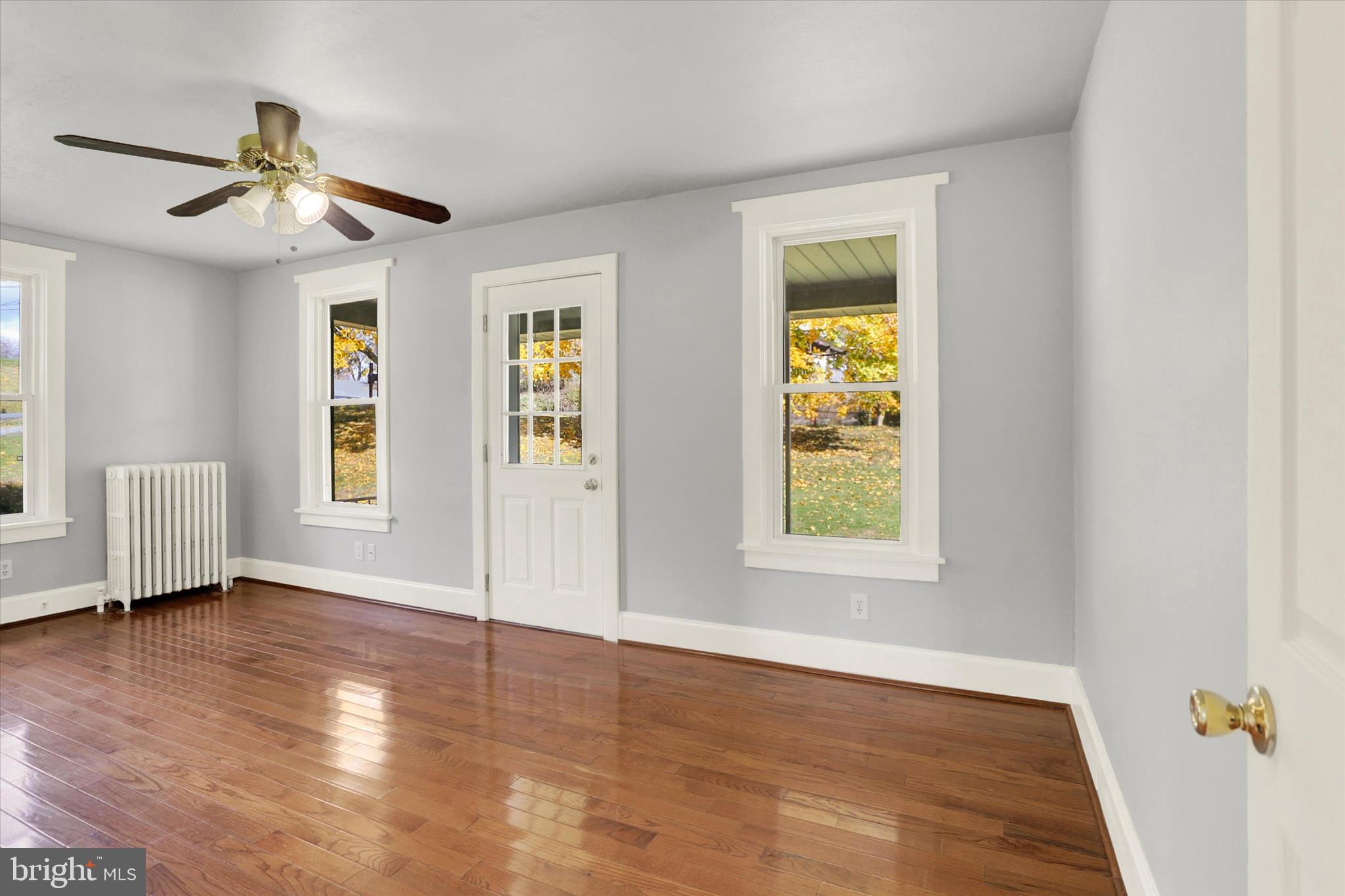 100 Roseglen Road Duncannon, PA 17020 - Photo 7 of 35 a view of an empty room with wooden floor and a window