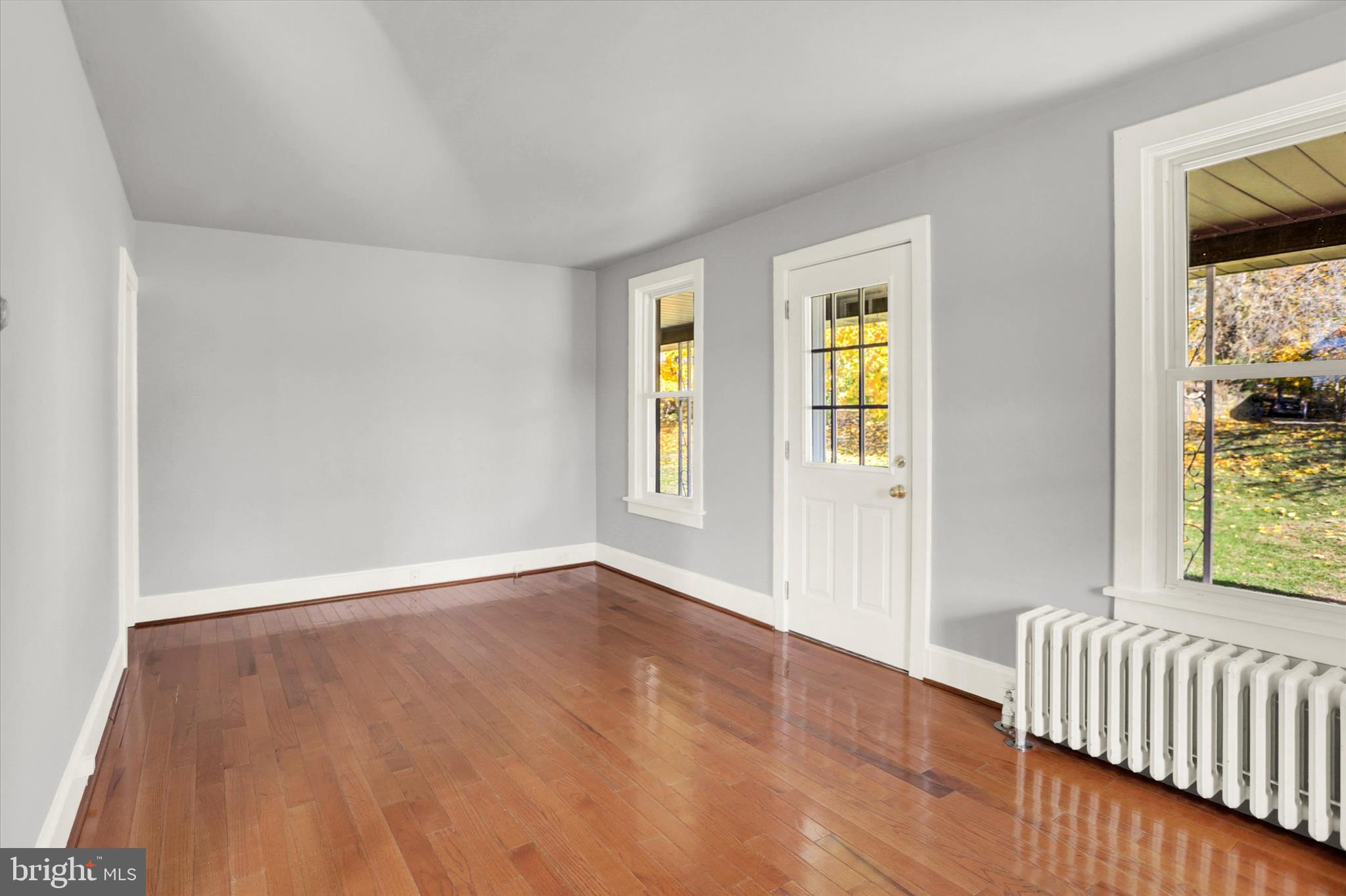 100 Roseglen Road Duncannon, PA 17020 - Photo 9 of 35 a view of an empty room with wooden floor and a window