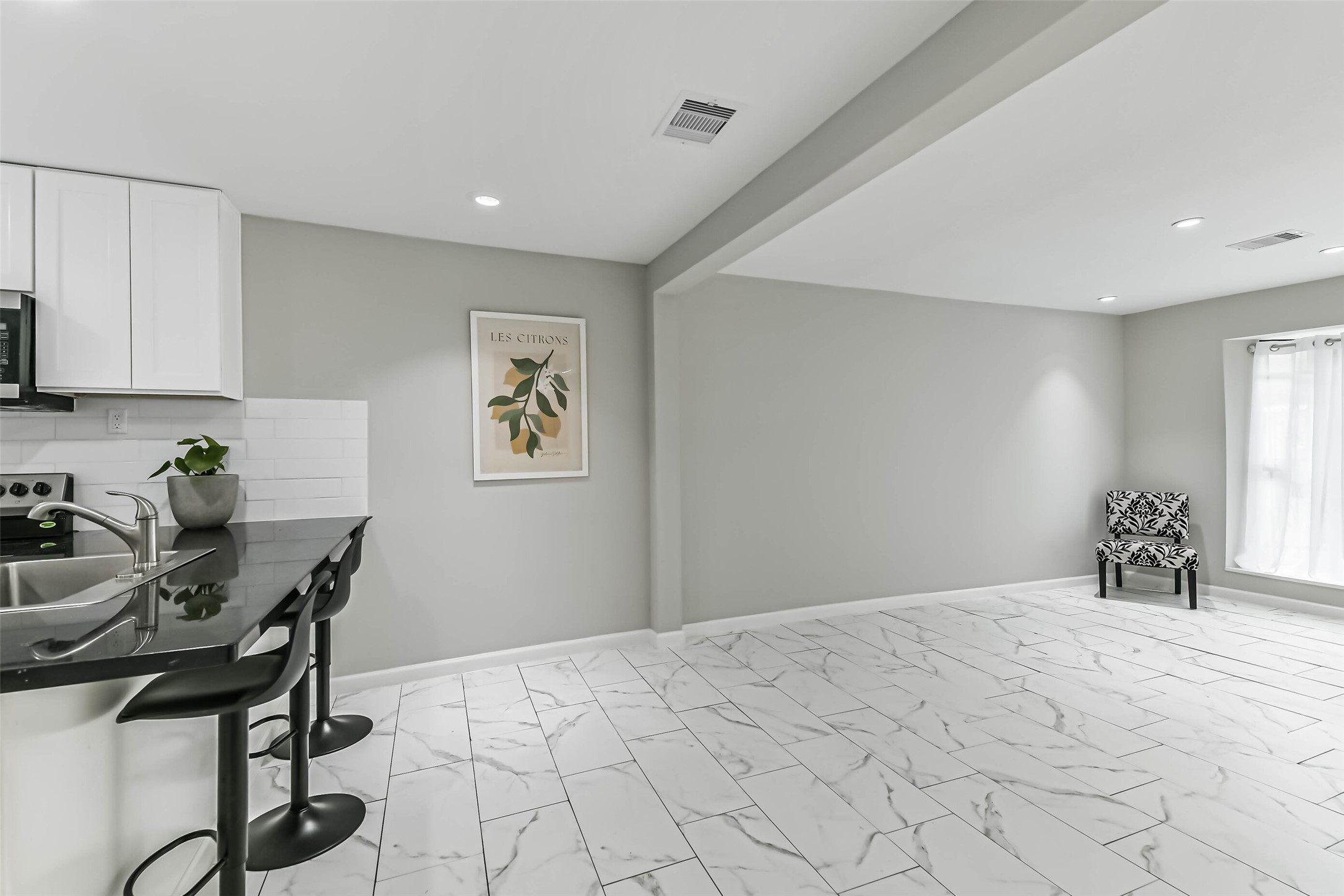 6853 Chasewood Drive Houston, TX 77489 - Photo 12 of 29 a bedroom with a bed a desk and chair