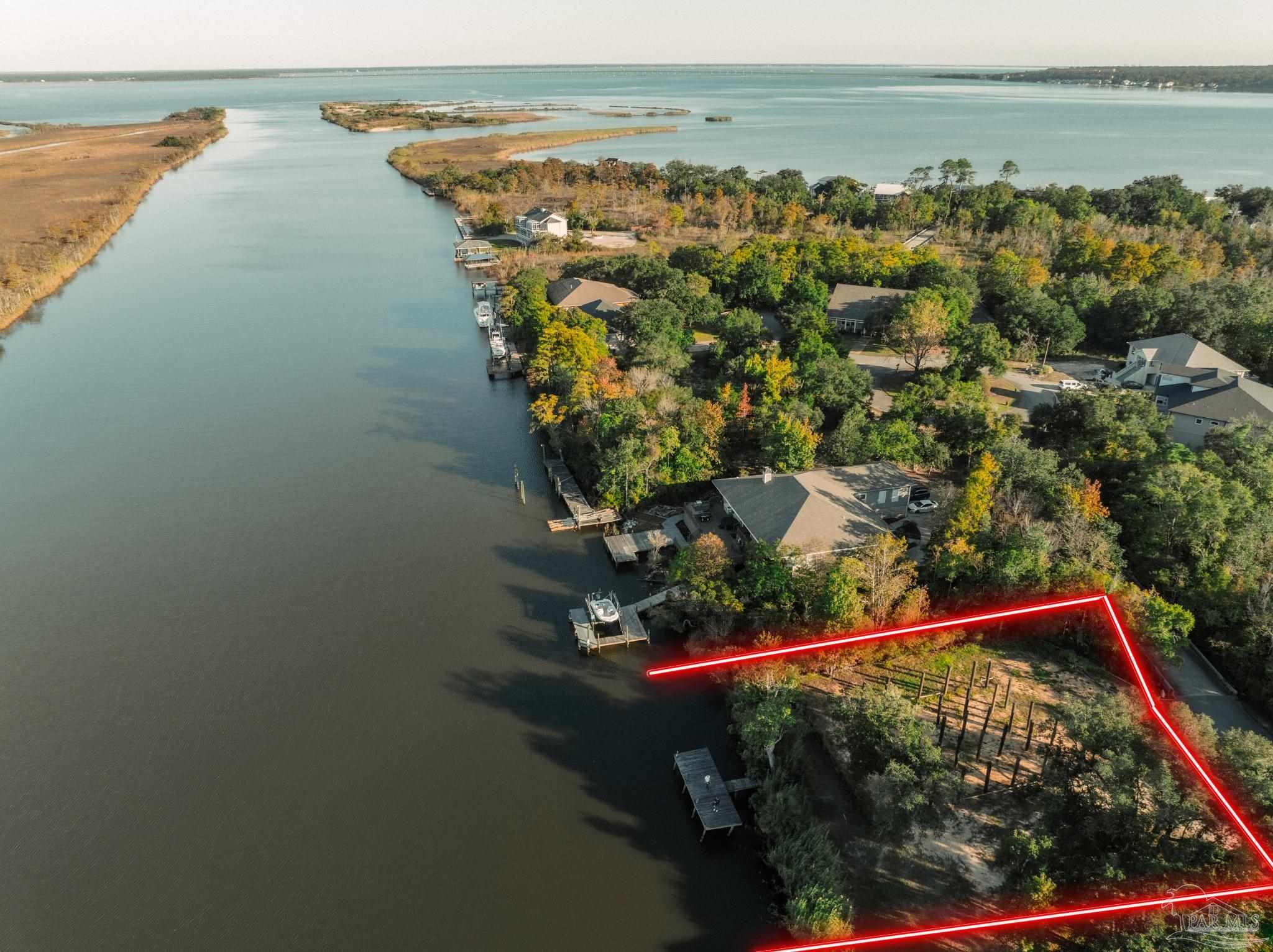 2022 Mackey Key Drive Pensacola, FL 32514 - Photo 1 of 15 a view of a lake with a outdoor space