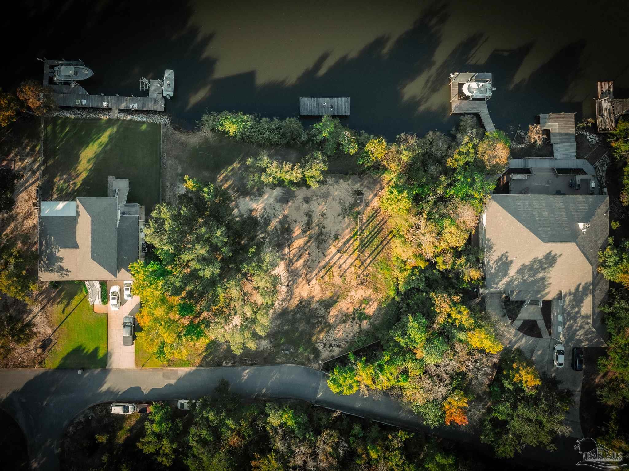 2022 Mackey Key Drive Pensacola, FL 32514 - Photo 14 of 15 an aerial view of a house yard swimming pool and outdoor seating