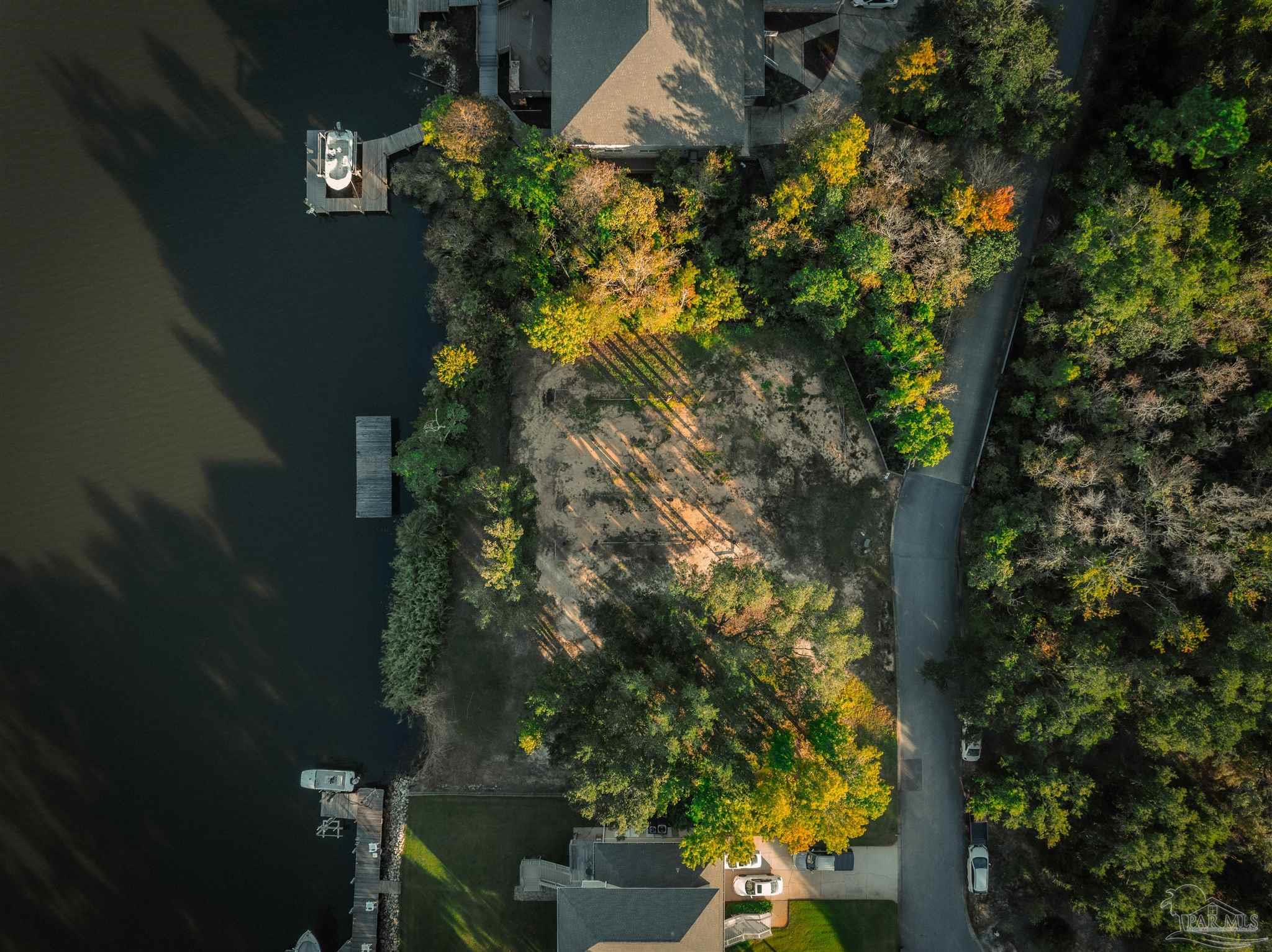 2022 Mackey Key Drive Pensacola, FL 32514 - Photo 7 of 15 a view of a house with a yard