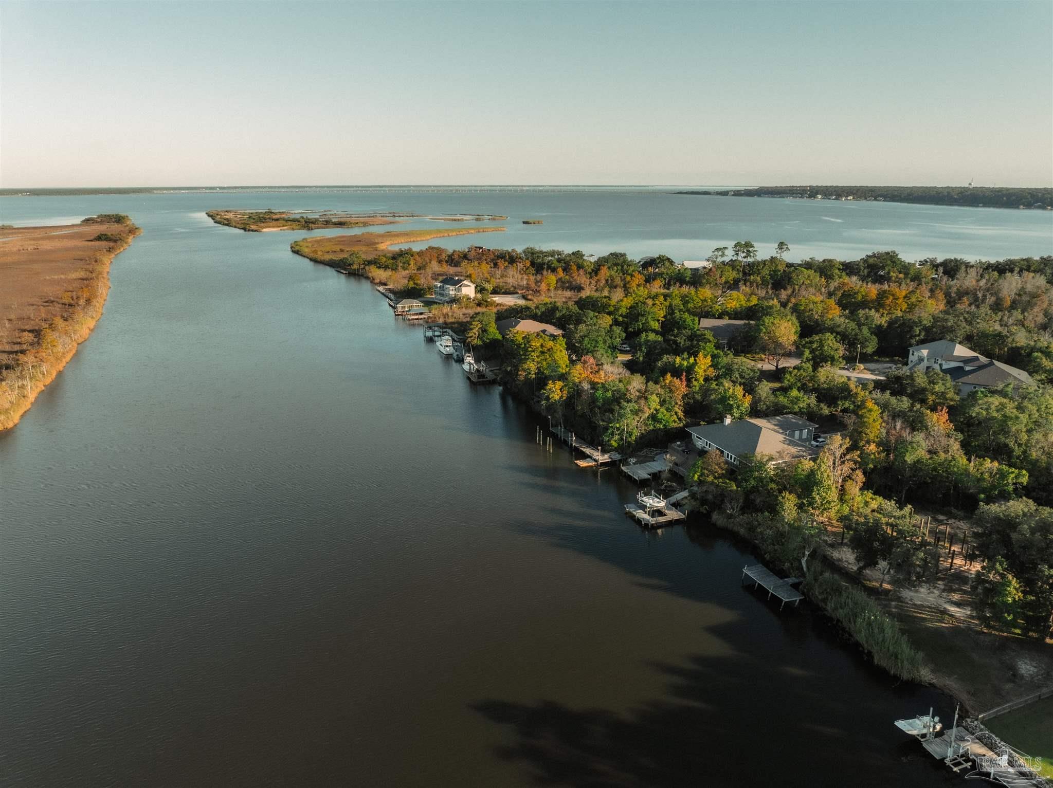2022 Mackey Key Drive Pensacola, FL 32514 - Photo 9 of 15 an aerial view of ocean and residential houses with outdoor space